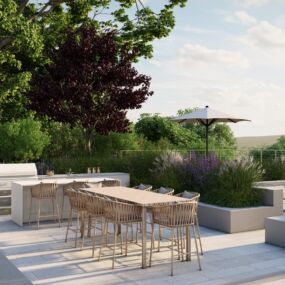 Cantilevered deck with outdoor kitchen and sculptural fire feature