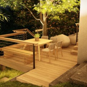 Night-lit hillside residence with multi-level decks by Ecocentrix Landscape Architecture